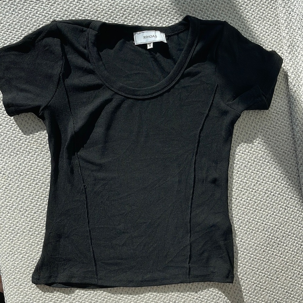 Black t shirt ! Great combo with every outfit.
